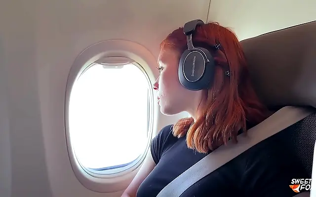 Busty Redhead Takes It All on a Secret Plane Ride