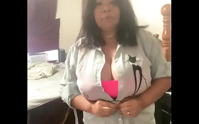 Her big tits bounce as she pleasures her soaking wet pussy