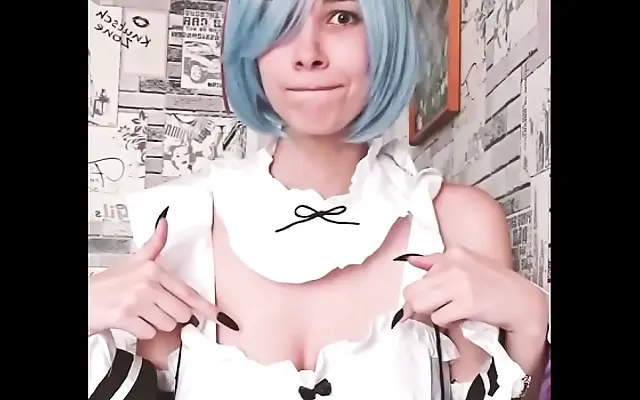 Tattooed beauty fondles her big natural tits in a sultry solo show