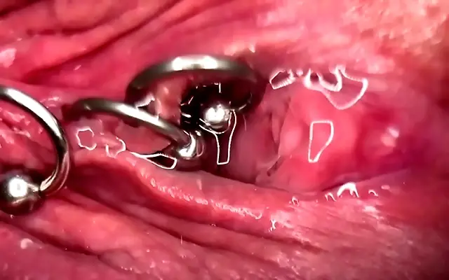 Pierced Clit Glistens as She Drips Piss into Her Soaking Pink Pussy