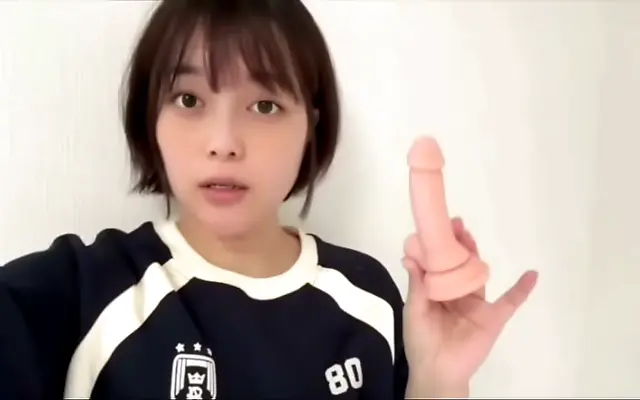Curvy Japanese student moans softly while exploring pleasure alone
